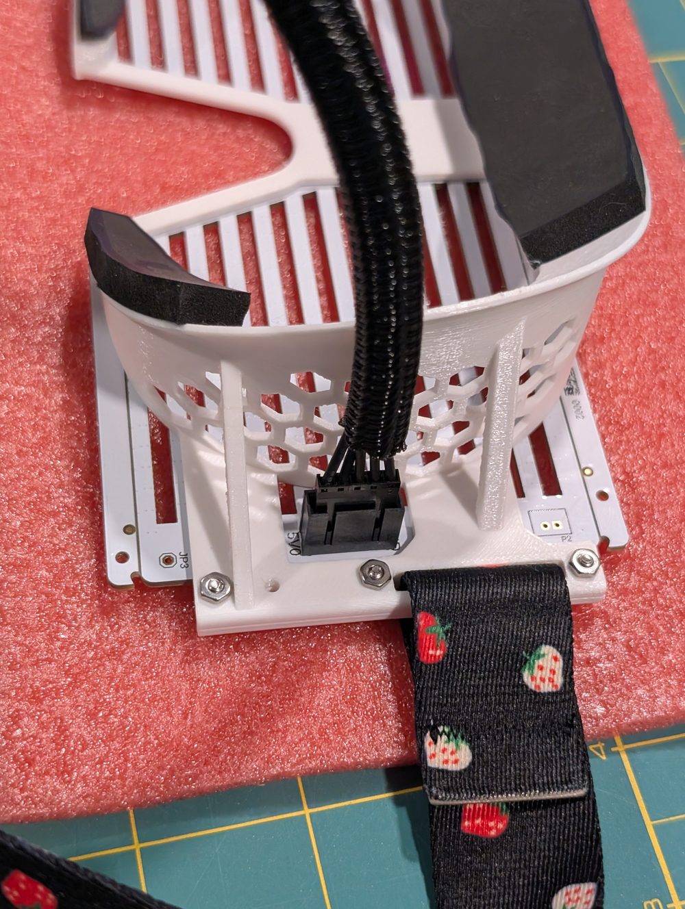 Connecting the LED panel cable to the glasses